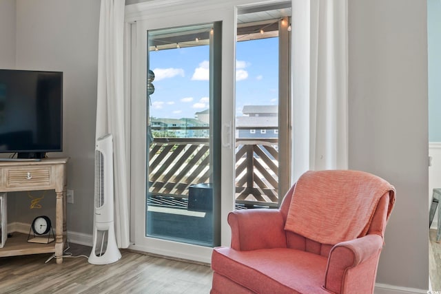 609 Hillside Dr S Unit C-16, North Myrtle Beach, SC 29582 - sitting room featuring wood finished floors and baseboards
