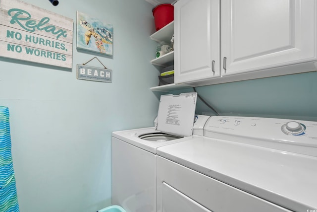 609 Hillside Dr S Unit C-16, North Myrtle Beach, SC 29582 - laundry room with washer and clothes dryer and cabinet space