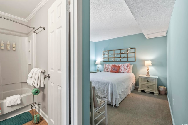 609 Hillside Dr S Unit C-16, North Myrtle Beach, SC 29582 - carpeted bedroom with crown molding, a textured ceiling, and baseboards