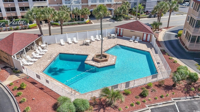 609 Hillside Dr S Unit C-16, North Myrtle Beach, SC 29582 - community pool with a fenced backyard and a patio