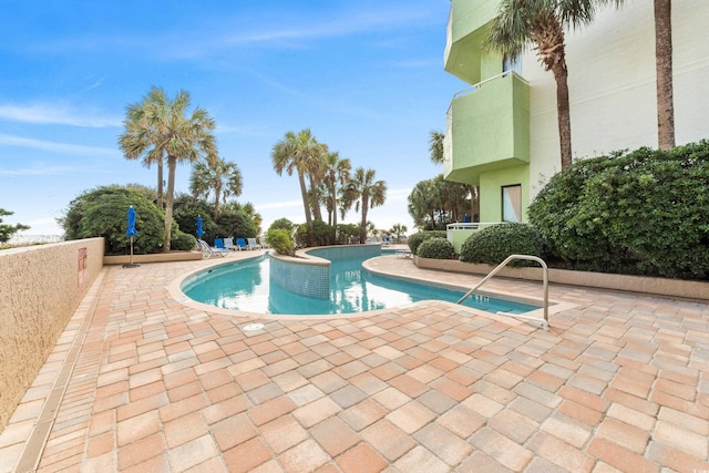 1105 S Ocean Blvd Unit 630, Myrtle Beach, SC 29577 - community pool featuring a patio area