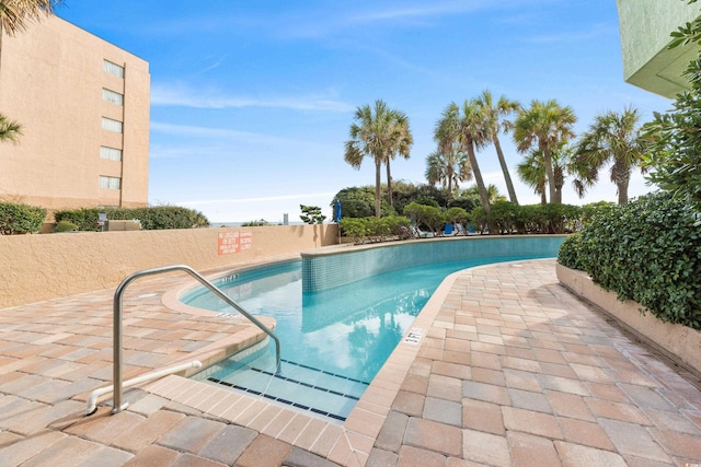 1105 S Ocean Blvd Unit 630, Myrtle Beach, SC 29577 - community pool featuring a patio