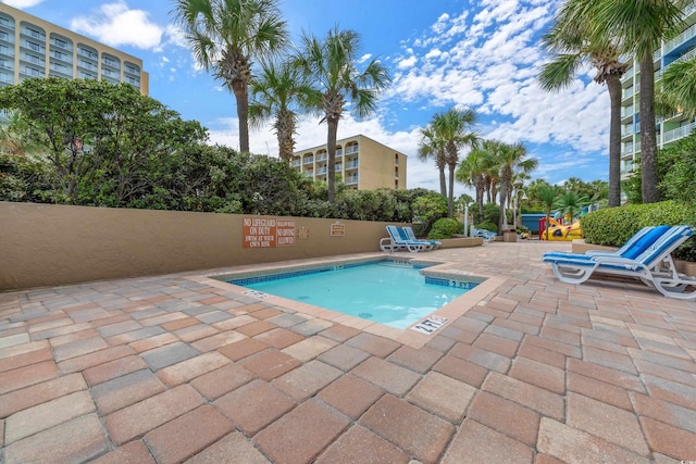 1105 S Ocean Blvd Unit 630, Myrtle Beach, SC 29577 - view of swimming pool with a patio area