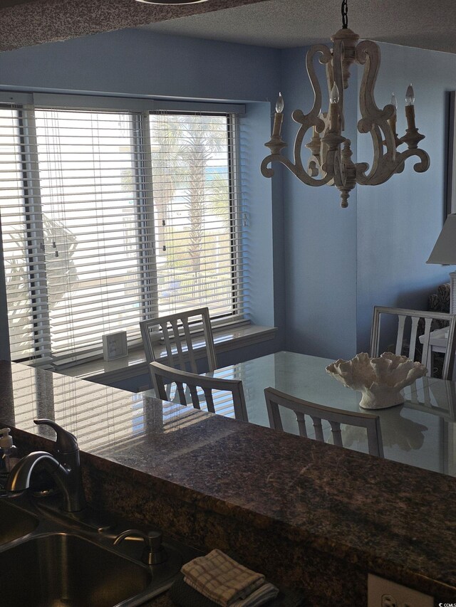 dining area with a chandelier