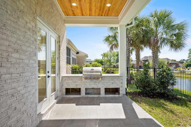 985 Shipmaster Ave, Myrtle Beach, SC 29579 - view of patio / terrace with fence, grilling area, area for grilling, and french doors