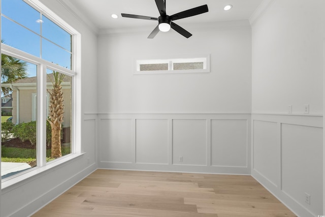 985 Shipmaster Ave, Myrtle Beach, SC 29579 - empty room with crown molding, light wood-style floors, and a decorative wall