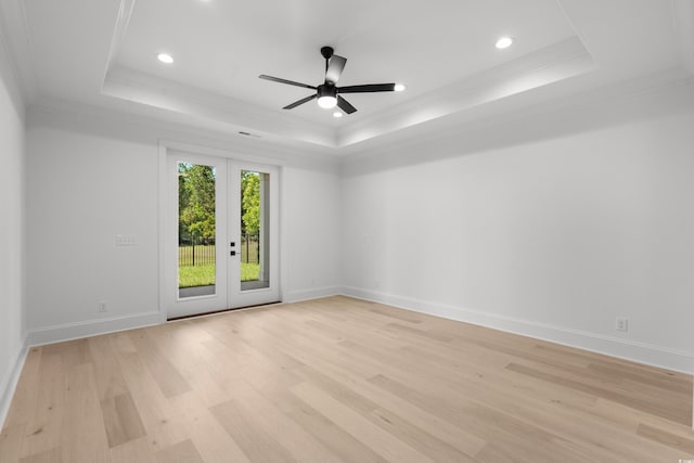 985 Shipmaster Ave, Myrtle Beach, SC 29579 - unfurnished room with light wood finished floors, french doors, a ceiling fan, recessed lighting, and a tray ceiling