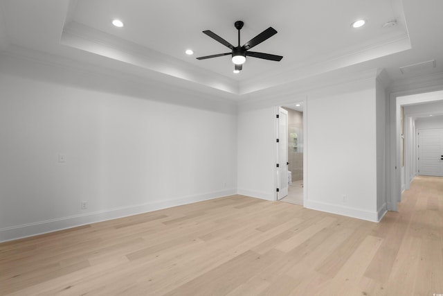 985 Shipmaster Ave, Myrtle Beach, SC 29579 - empty room featuring a ceiling fan, a tray ceiling, recessed lighting, and light wood finished floors
