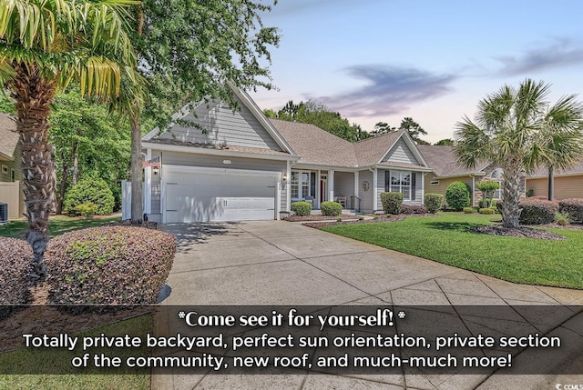 single story home with an attached garage, central AC, a front yard, and concrete driveway