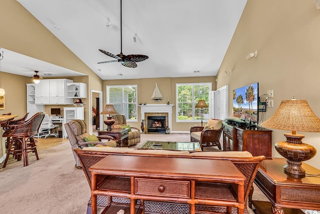 156 Summerlight Dr, Murrells Inlet, SC 29576 - living area with a ceiling fan, light carpet, high vaulted ceiling, and a warm lit fireplace