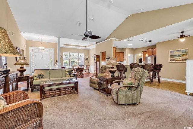 156 Summerlight Dr, Murrells Inlet, SC 29576 - living room featuring ceiling fan, light carpet, lofted ceiling, light tile patterned floors, and decorative columns