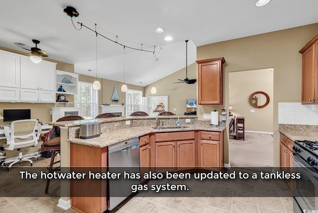 156 Summerlight Dr, Murrells Inlet, SC 29576 - kitchen with stainless steel dishwasher, a ceiling fan, open floor plan, a peninsula, and decorative light fixtures