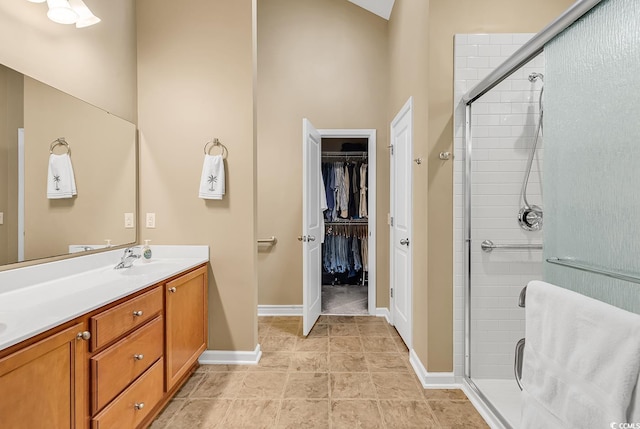 156 Summerlight Dr, Murrells Inlet, SC 29576 - full bathroom with a stall shower, vanity, a walk in closet, and baseboards