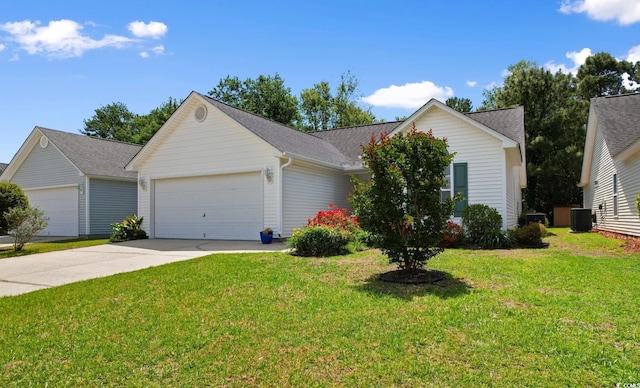 ranch-style house featuring a front yard, cooling unit, a shingled roof, concrete driveway, and an attached garage