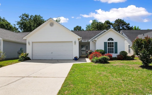 ranch-style house with an attached garage, a front lawn, and driveway