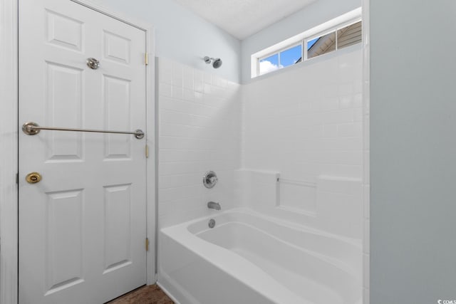 full bath featuring washtub / shower combination
