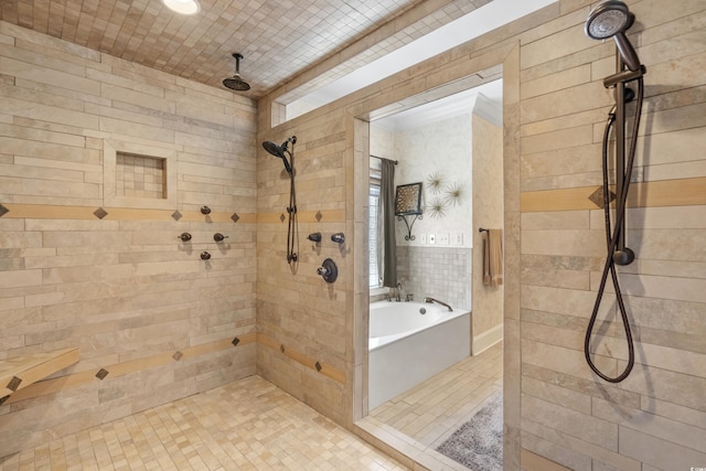 full bath with a bath, tile patterned flooring, and tiled shower