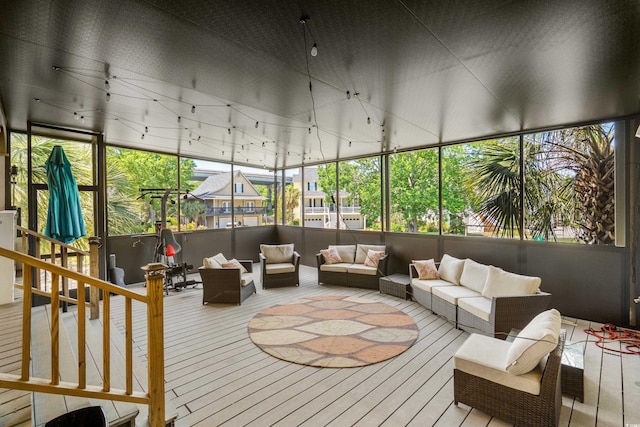 sunroom featuring a healthy amount of sunlight