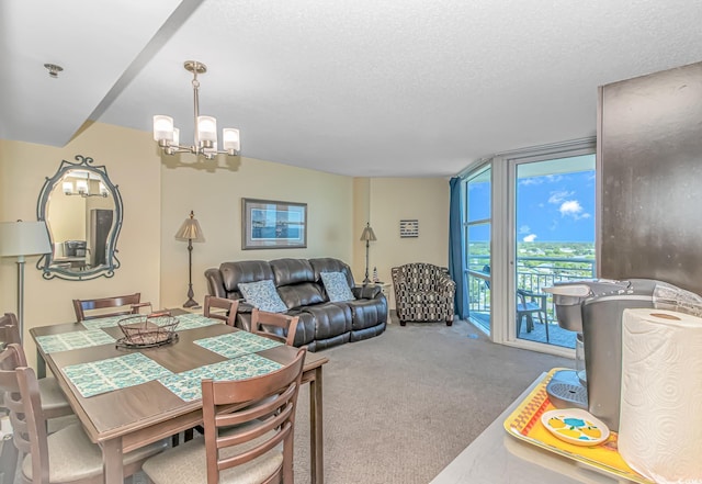 2301 S Ocean Blvd Unit 1202, North Myrtle Beach, SC 29582 - dining area with carpet floors, floor to ceiling windows, a textured ceiling, and a chandelier