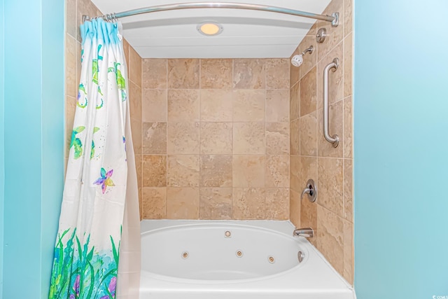 full bathroom featuring a combined bath / shower with jetted tub