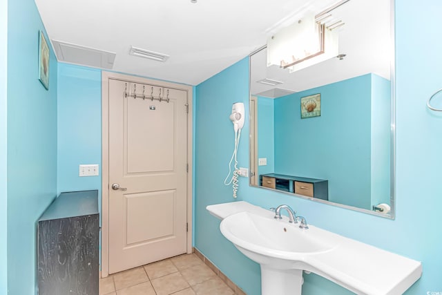 bathroom featuring tile patterned flooring and visible vents