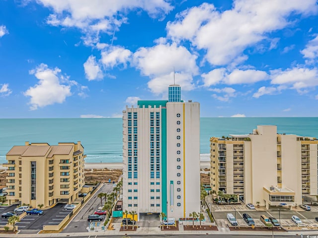 view of building exterior featuring a water view