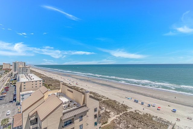 bird's eye view with a water view and a view of the beach