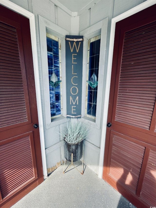 entrance to property with a porch