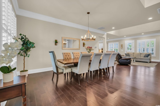 dining room featuring crown molding, baseboards, a chandelier, and dark wood-type flooring