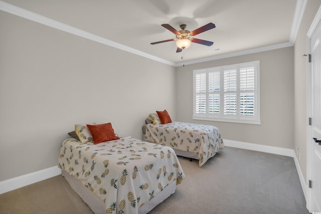 bedroom with baseboards, ornamental molding, carpet, and ceiling fan