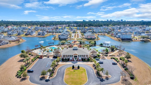 aerial view featuring a residential view and a water view