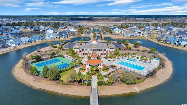 bird's eye view with a water view and a residential view