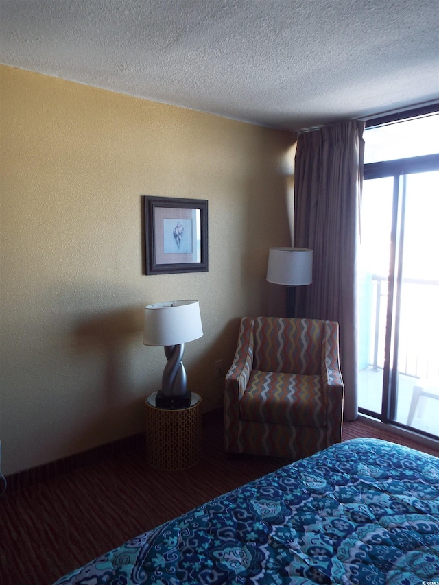 bedroom featuring a textured ceiling