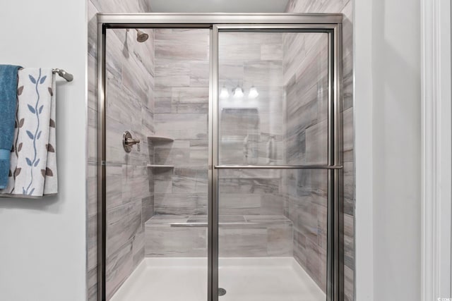 full bathroom with a shower stall