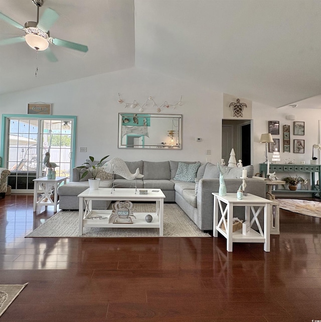 living area featuring high vaulted ceiling and a ceiling fan