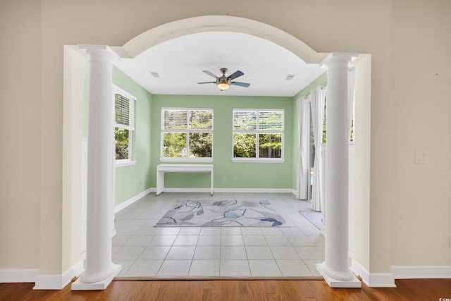 140 Zinnia Dr, Myrtle Beach, SC 29579 - doorway with ceiling fan, a wealth of natural light, baseboards, and decorative columns