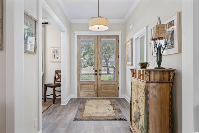 1028 Whooping Crane Dr, Conway, SC 29526 - foyer featuring wood finished floors, ornamental molding, baseboards, and french doors