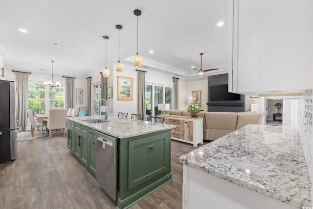 1028 Whooping Crane Dr, Conway, SC 29526 - kitchen with green cabinets, stainless steel appliances, a sink, a chandelier, and dark wood-type flooring