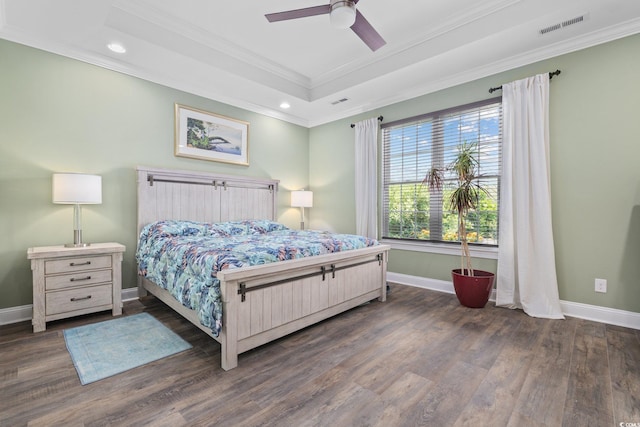 1028 Whooping Crane Dr, Conway, SC 29526 - bedroom with wood finished floors, crown molding, baseboards, recessed lighting, and a raised ceiling