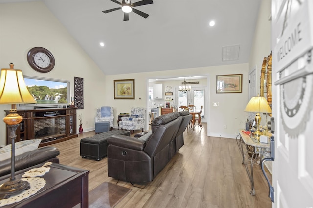 113 Edwards Ln, Longs, SC 29568 - living room featuring high vaulted ceiling, a chandelier, a ceiling fan, wood finished floors, and recessed lighting