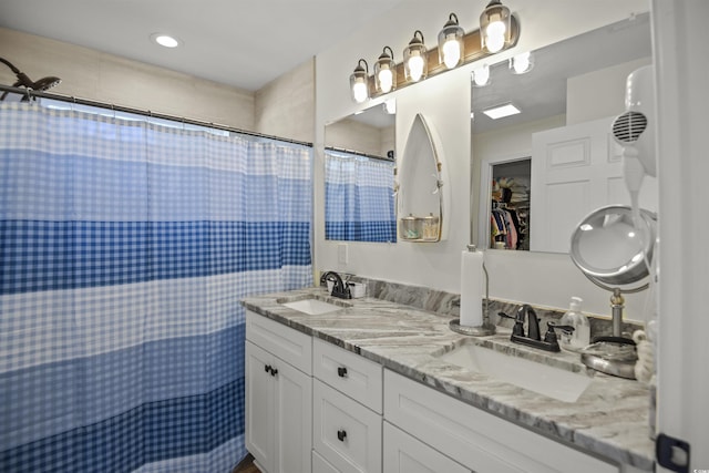113 Edwards Ln, Longs, SC 29568 - bathroom with double vanity and a shower with shower curtain