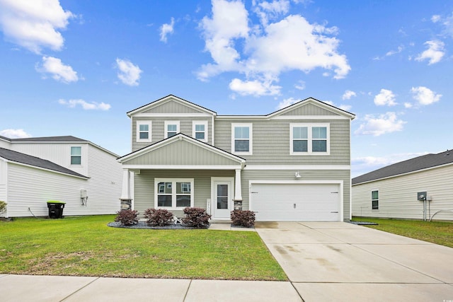 1015 Saltgrass Way, Myrtle Beach, SC 29588 - craftsman-style home with board and batten siding, covered porch, an attached garage, concrete driveway, and a front lawn