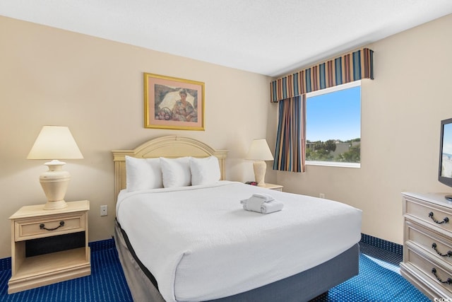 2000 N Ocean Blvd Unit 301, Myrtle Beach, SC 29577 - bedroom featuring dark colored carpet