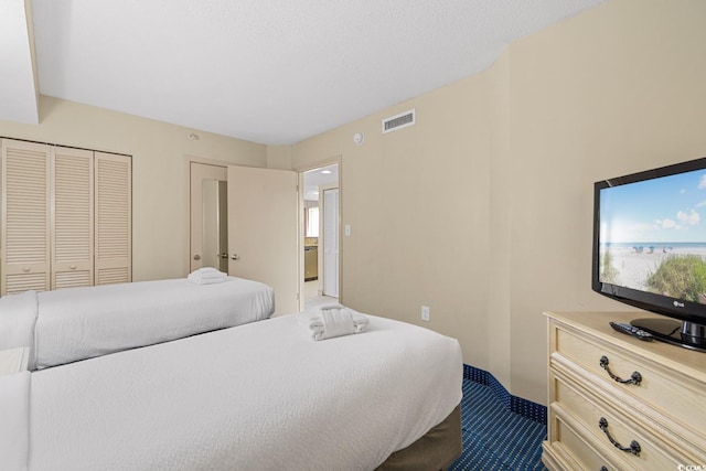 2000 N Ocean Blvd Unit 301, Myrtle Beach, SC 29577 - bedroom with dark colored carpet