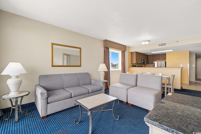 2000 N Ocean Blvd Unit 301, Myrtle Beach, SC 29577 - living room with light carpet