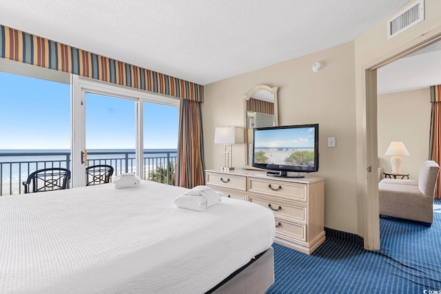 2000 N Ocean Blvd Unit 301, Myrtle Beach, SC 29577 - bedroom with dark carpet, access to outside, and baseboards