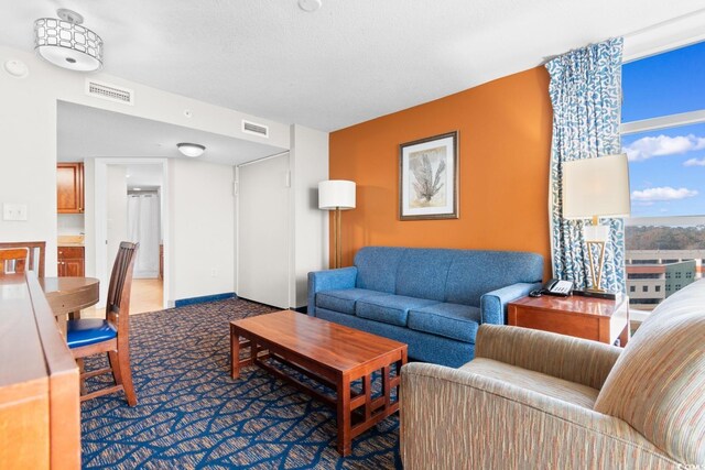 5200 N Ocean Blvd Unit 833, Myrtle Beach, SC 29577 - living area featuring visible vents and carpet