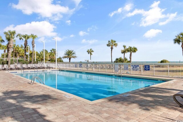 5200 N Ocean Blvd Unit 833, Myrtle Beach, SC 29577 - community pool with fence and a patio