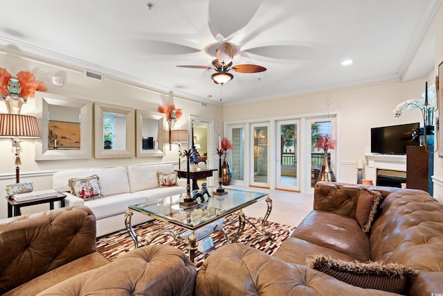 living room with ceiling fan, recessed lighting, and ornamental molding