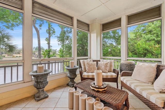 sunroom featuring outdoor lounge area and healthy amount of natural light